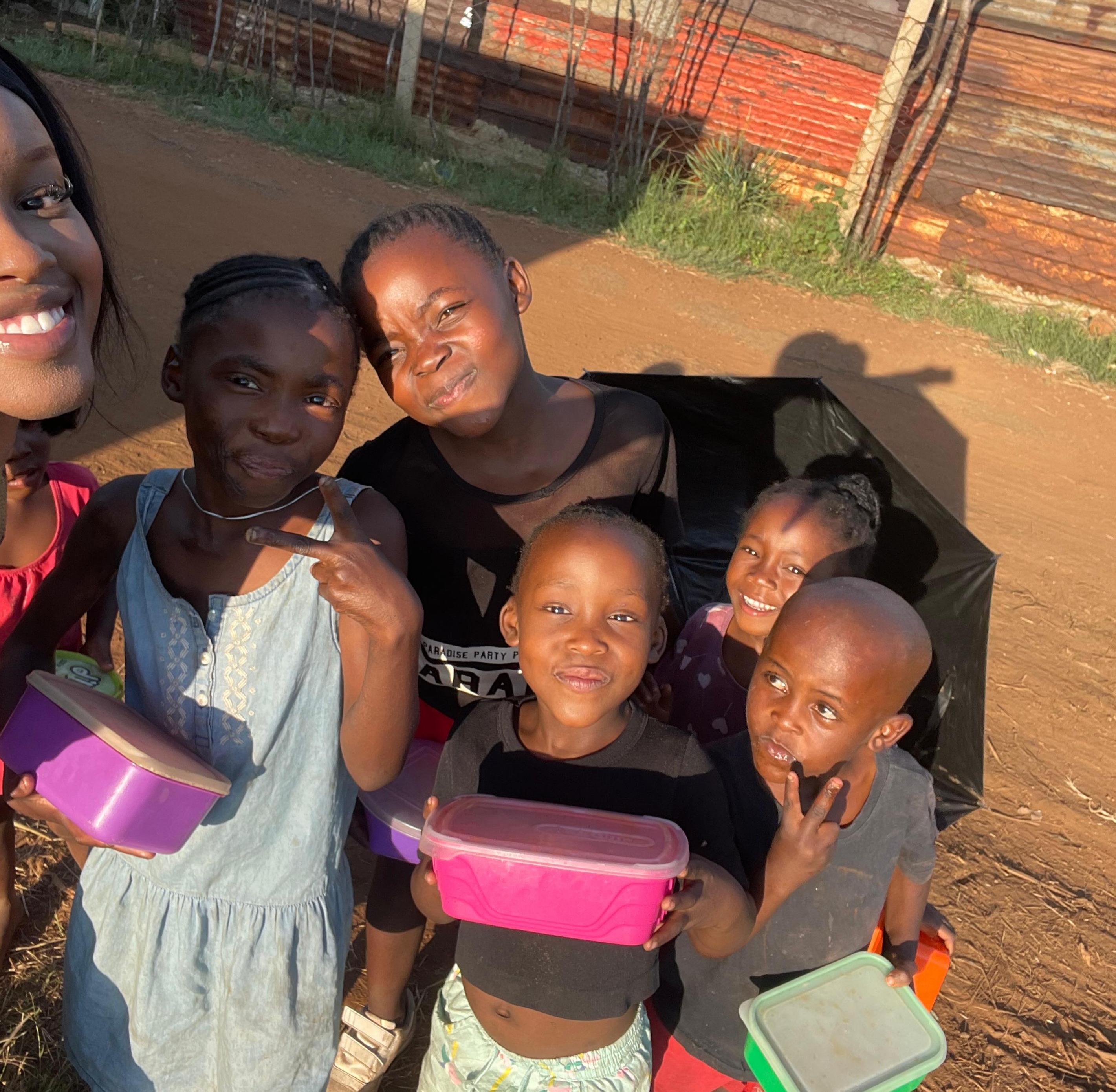 Kids with volunteer